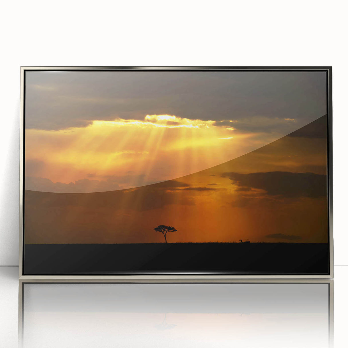 Acrylic print of a serene Kenyan landscape in silver frame, featuring soft earth tones.