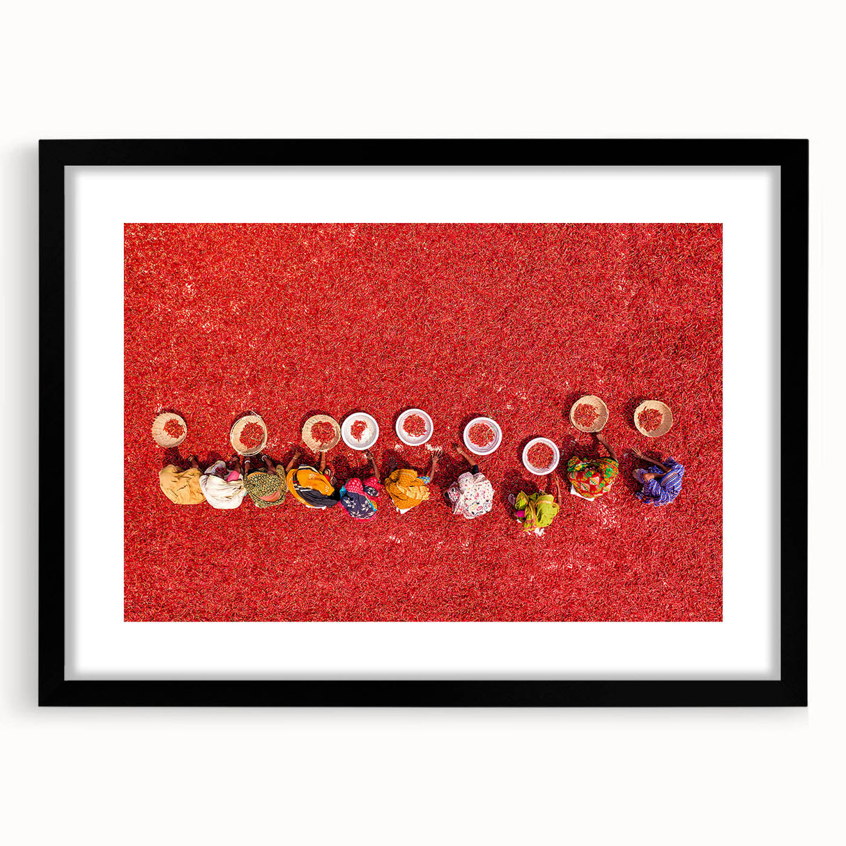 Extra large abstract art print featuring vibrant, colorful textures, ideal for living room decor, in a black frame with mat.