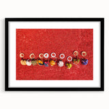 Extra large abstract art print featuring vibrant, colorful textures, ideal for living room decor, in a black frame with mat.
