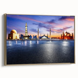Framed canvas depicting a vintage-style landscape painting of a Pakistani scenery in muted gold and black tones.