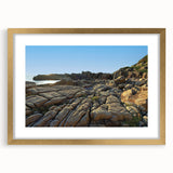 Extra large abstract art print featuring a textured landscape in earthy tones, framed in gold, ideal for living room decor.