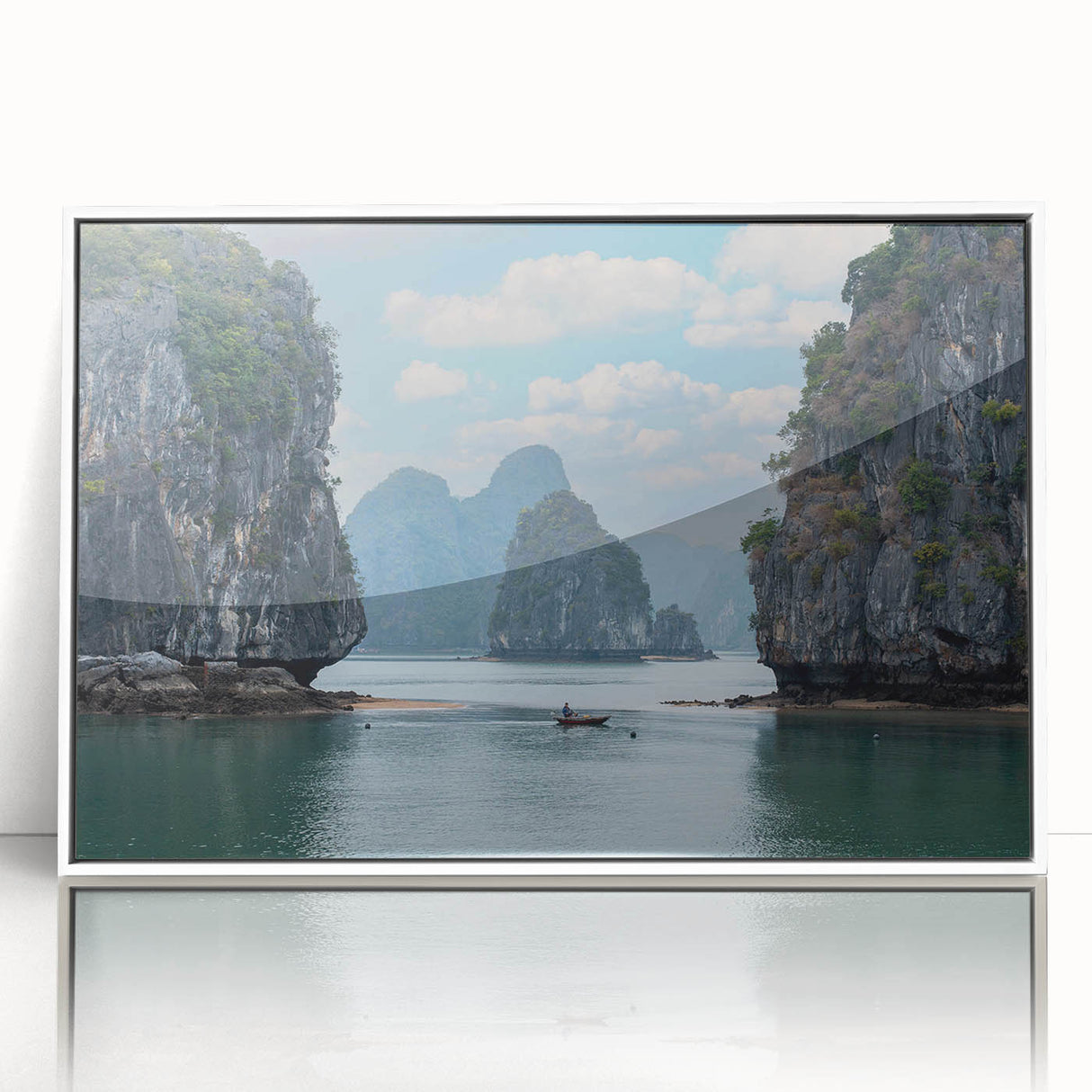 Acrylic print of a serene Vietnamese landscape in muted green and blue tones, framed in white.
