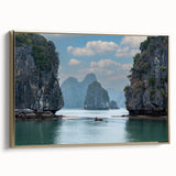Framed canvas featuring a vintage-style landscape painting of a Vietnamese scenery in gold and black tones.