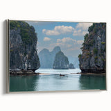 Framed canvas featuring a vintage-style landscape painting of a Vietnamese rural scene in vibrant colors.
