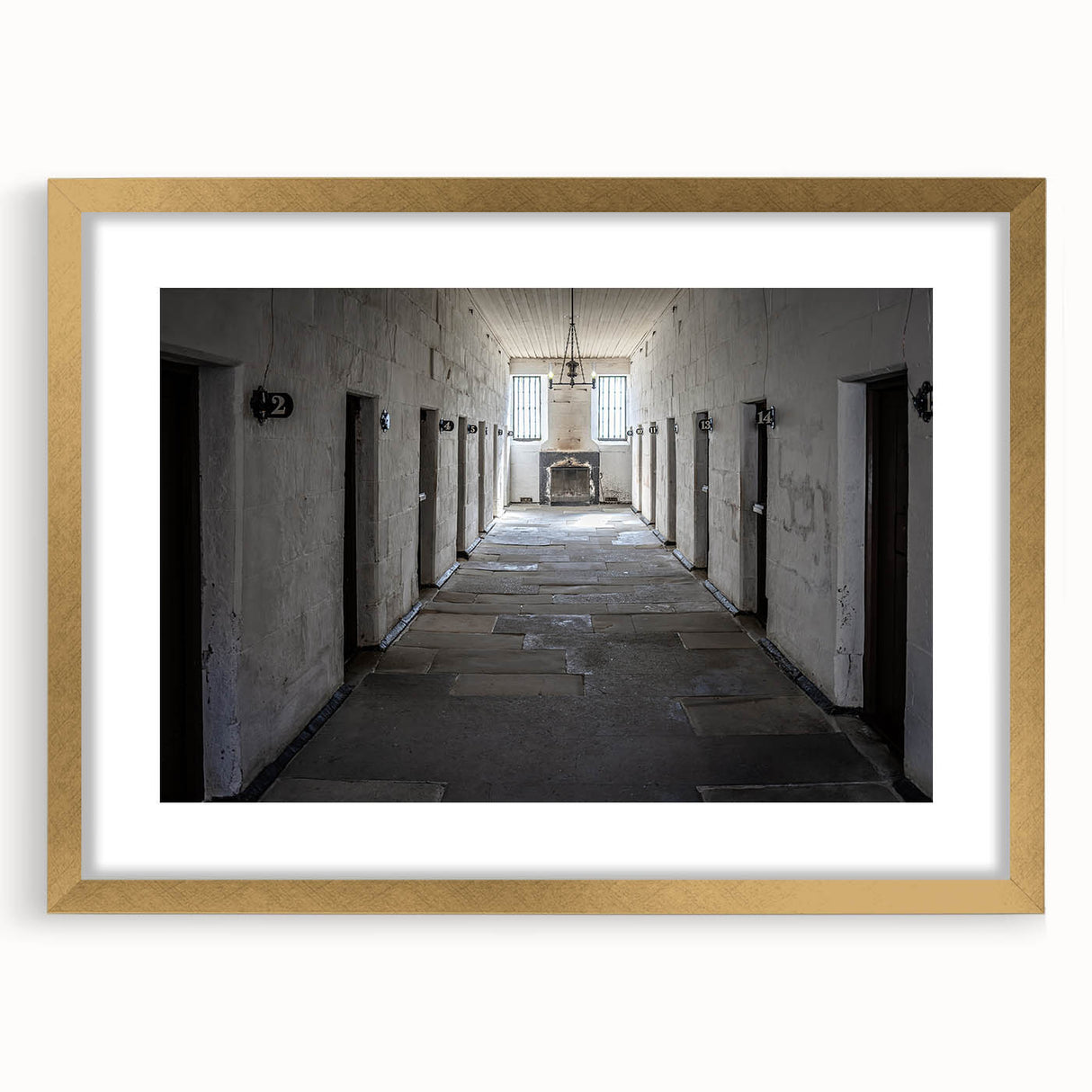 Abstract art print depicting a serene Tasmania landscape in muted earth tones on a framed gold mat.