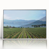 Art Deco poster featuring a serene British Columbia landscape in muted green and blue tones, framed acrylic.