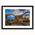 Extra large abstract art print of a European landscape in vibrant colors on a textured canvas, framed in black.