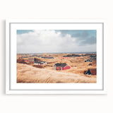 Textured art abstract print of a European scenery in muted earth tones, framed with a white mat, suitable for bedroom decor.