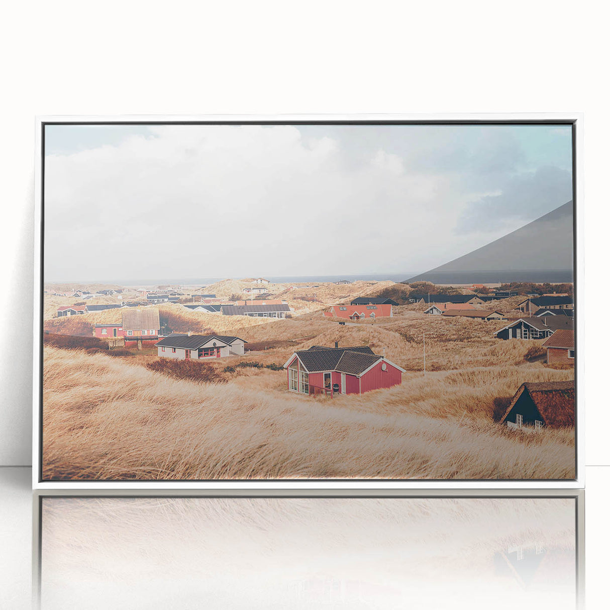Mid-century modernist art depicting a serene Danish landscape in muted blue and green tones, acrylic print framed in white.