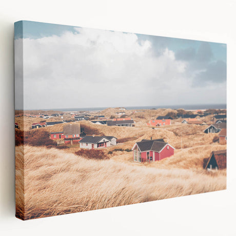 Side view of a stretched canvas depicting a serene European landscape in muted green and blue tones.
