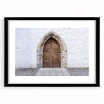 Extra large abstract art print featuring a colorful, textured depiction of a European scenery on a framed black mat.