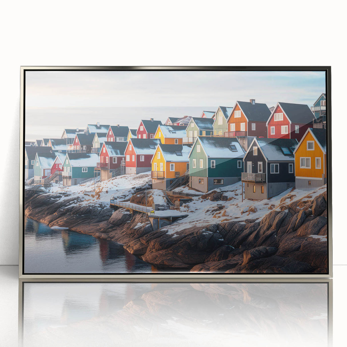 Large art print of a Greenland scenery in muted green and blue tones, framed in silver acrylic.