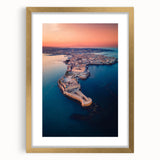 Abstract art print of Sicilian landscape in muted earth tones, framed in gold, suitable for dining room decor.