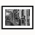 Extra large abstract art print of Venice in vibrant colors on a textured canvas, framed in black.