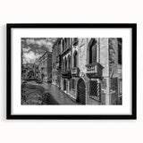Extra large abstract art print of Venice in vibrant colors on a textured canvas, framed in black.