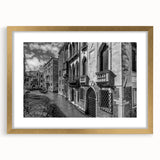 Abstract art print of Venice with muted gold and blue tones on a framed canvas, ideal for dining room decor.