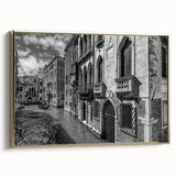 Framed canvas of Venice landscape in vintage poster style, with muted gold and black tones, ideal for bedroom wall art.