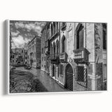 Vintage poster art of Venice scenery on framed canvas, featuring colorful artwork against a black background.