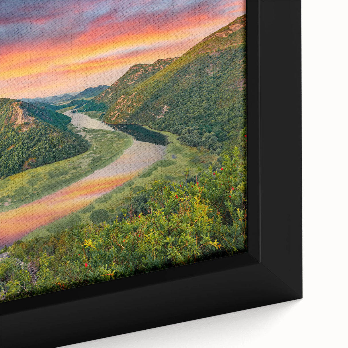 Extra large framed canvas featuring a textured depiction of a Montenegro scenery in black with vibrant color accents.