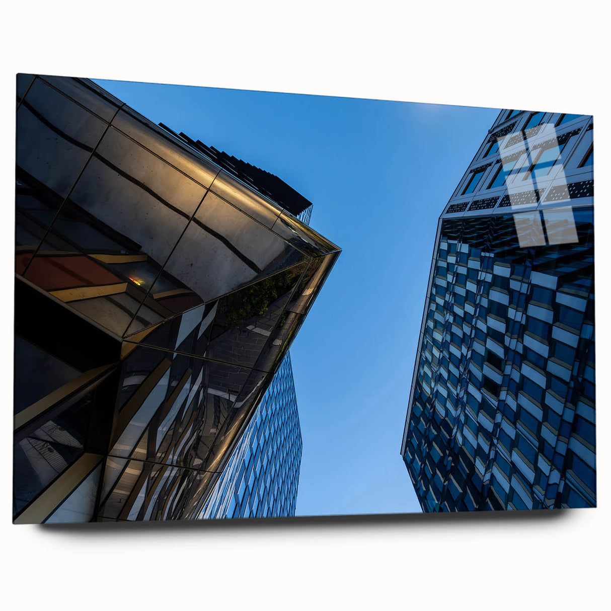 Acrylic print of a large abstract depiction of Stockholm's skyline in cool blue and gray tones.
