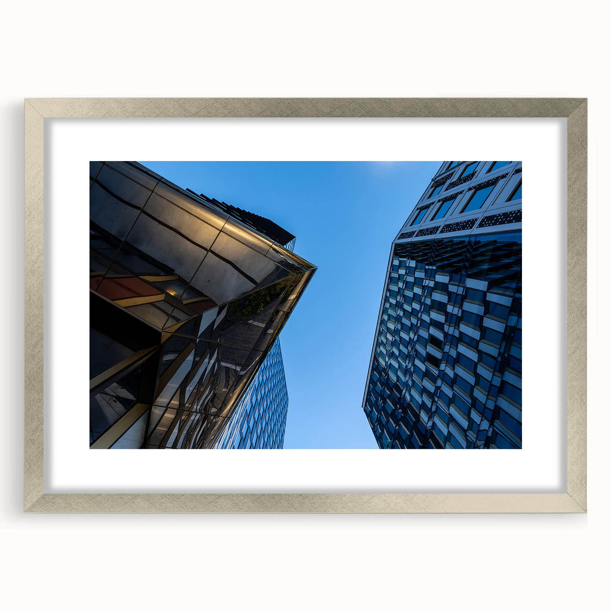 Textured abstract art print of Stockholm's skyline in cool blue and gray tones on a framed canvas.