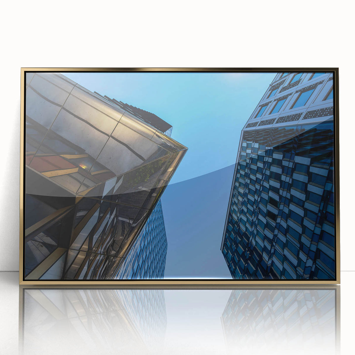 Large acrylic print of Stockholm scenery in gold frame, featuring mid-century modernist style.