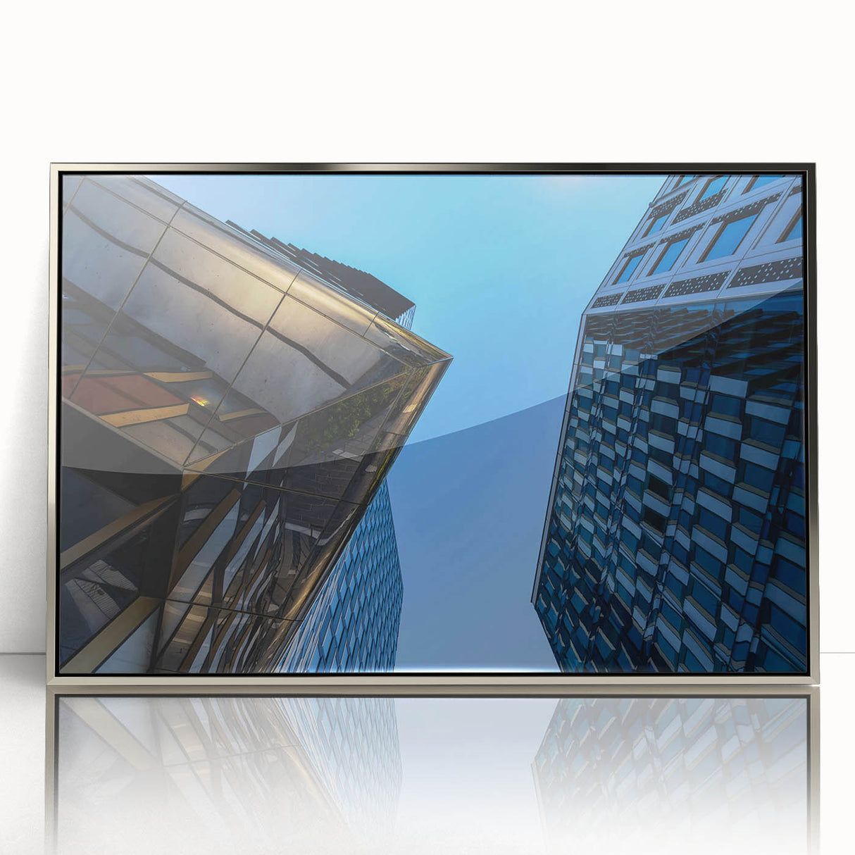 Mid-century modernist art depicting Stockholm scenery in muted blue and silver hues on a framed acrylic print.