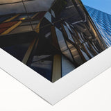 Art deco poster of Stockholm skyline in muted blue and gray tones on rolled canvas, suitable for dining room wall art.