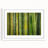 Abstract art print of Oaxaca scenery in muted earth tones on a white framed canvas, suitable for dining room decor.