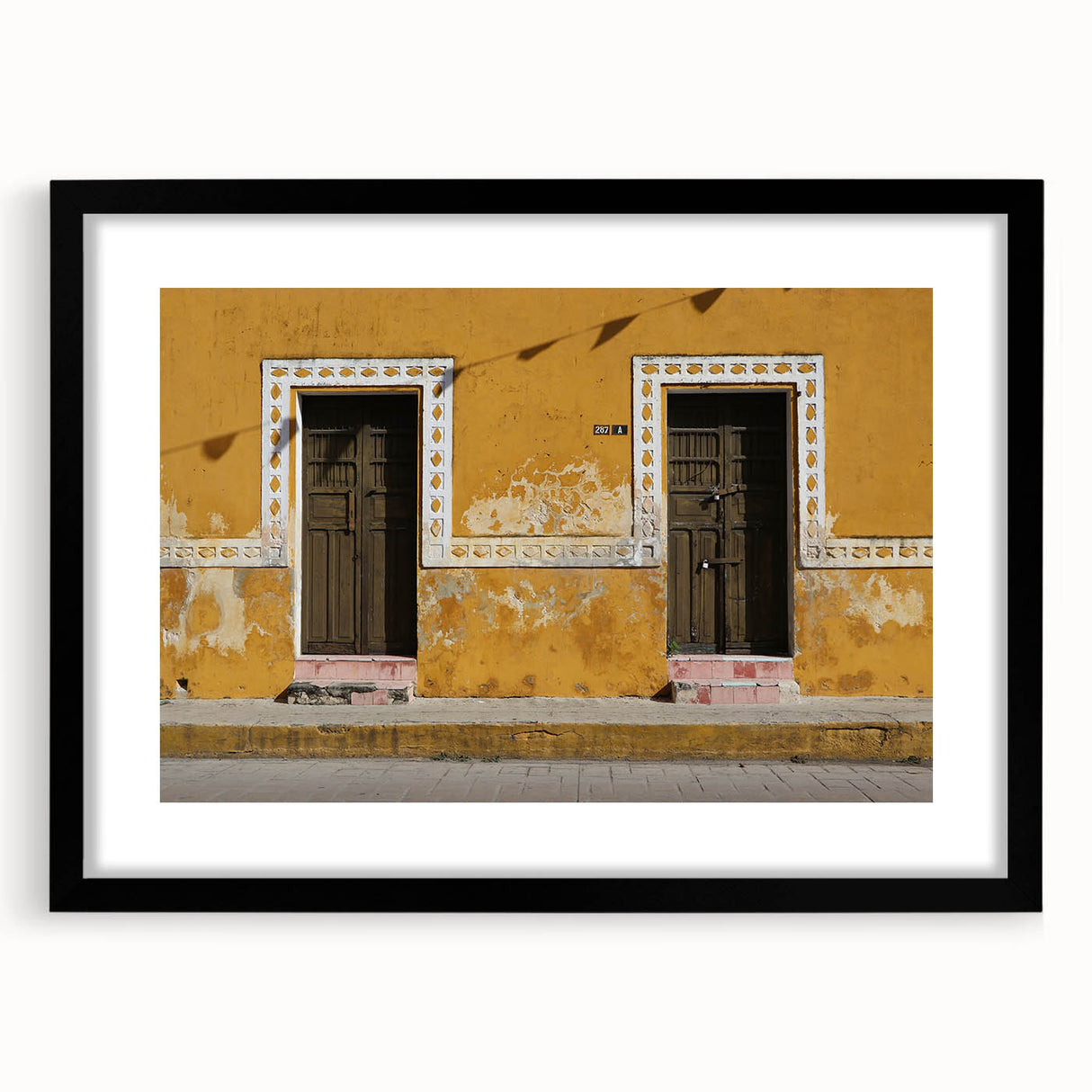 Extra large abstract art print featuring vibrant, colorful textures of a Quintana Roo scenery in a black frame.