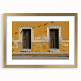 Extra large abstract art print depicting a textured scenery of Quintana Roo in muted earth tones, framed in gold.