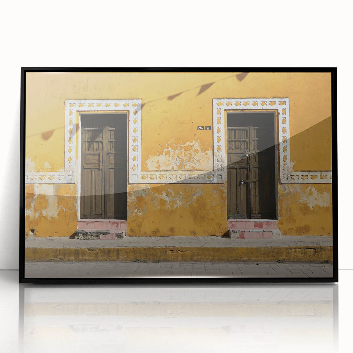 Large abstract wall art depicting a vibrant, colorful Mexican Quintana Roo scenery on a black-framed acrylic print.