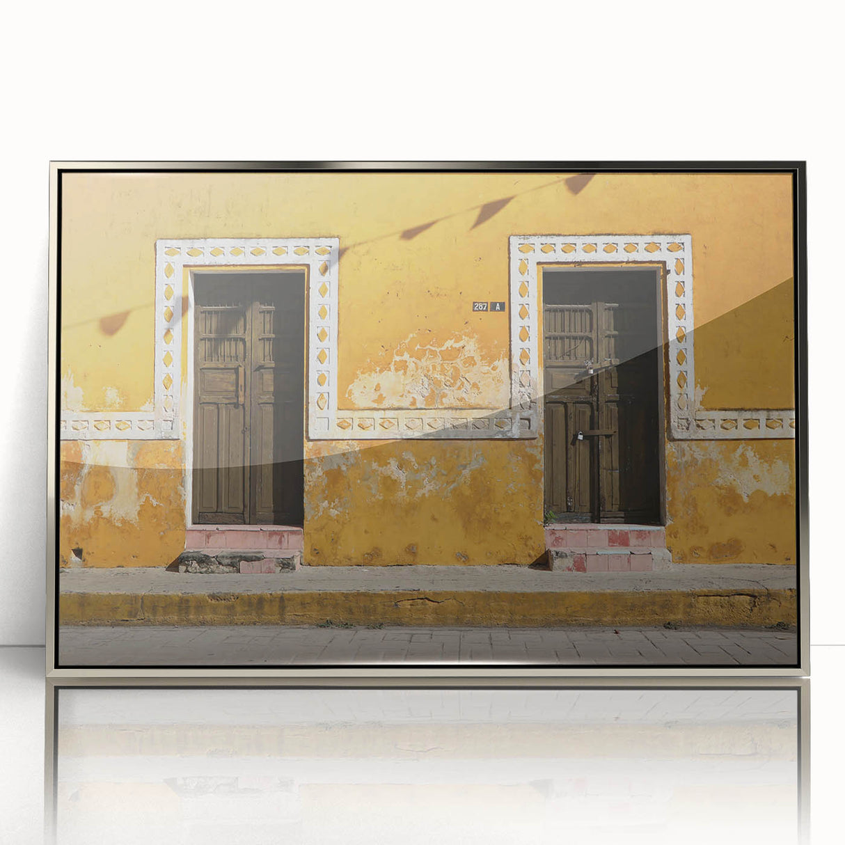 Mid-century modernist art depicting a serene Quintana Roo scenery in muted blue and green tones on a silver-framed acrylic…