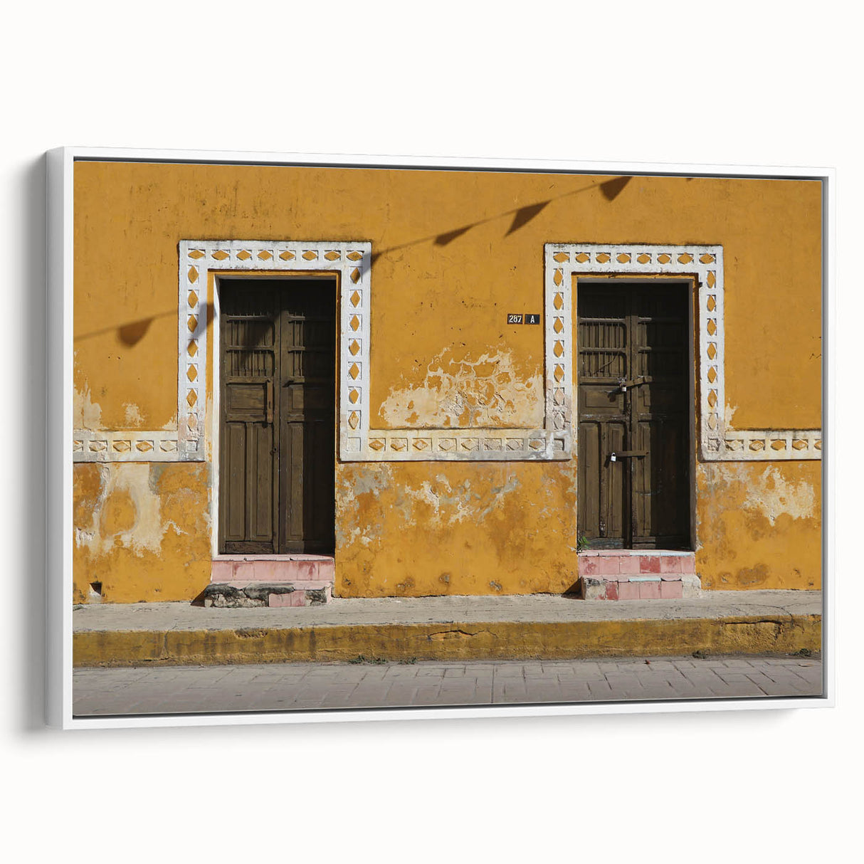 Framed canvas of a vintage poster art depicting a colorful Mexican Quintana Roo landscape, ideal for living room decor.
