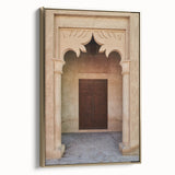 Framed canvas of Dubai landscape with vintage poster art style, featuring black and gold tones.
