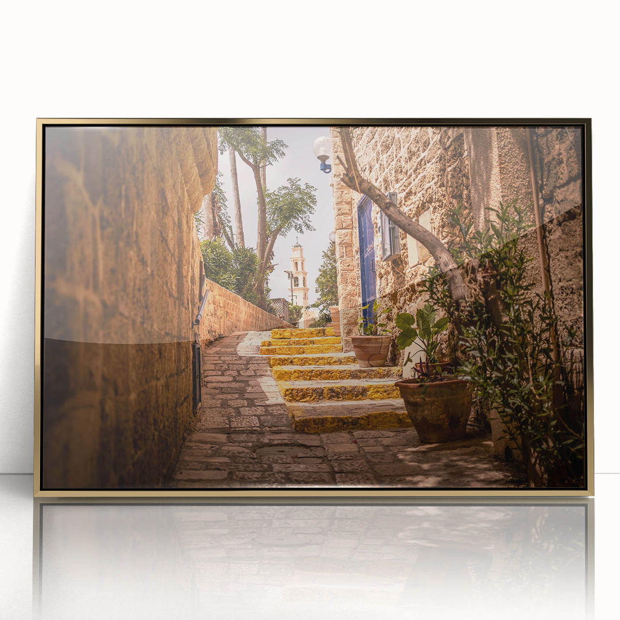 Framed acrylic print of Jerusalem in gold and blue tones, in a mid-century modernist style.