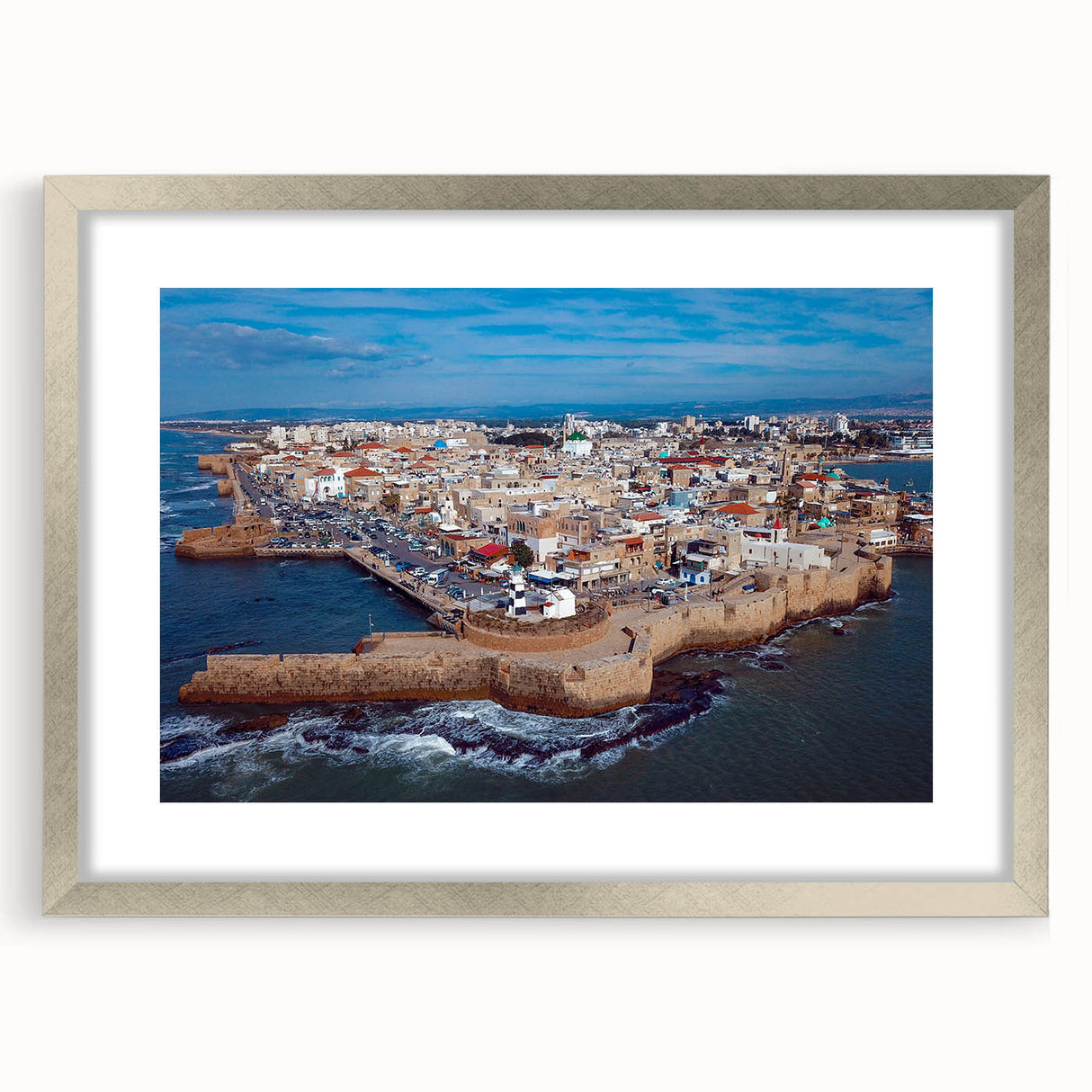 Textured art depicting an abstract Middle Eastern scenery in muted earth tones, framed with a silver mat.