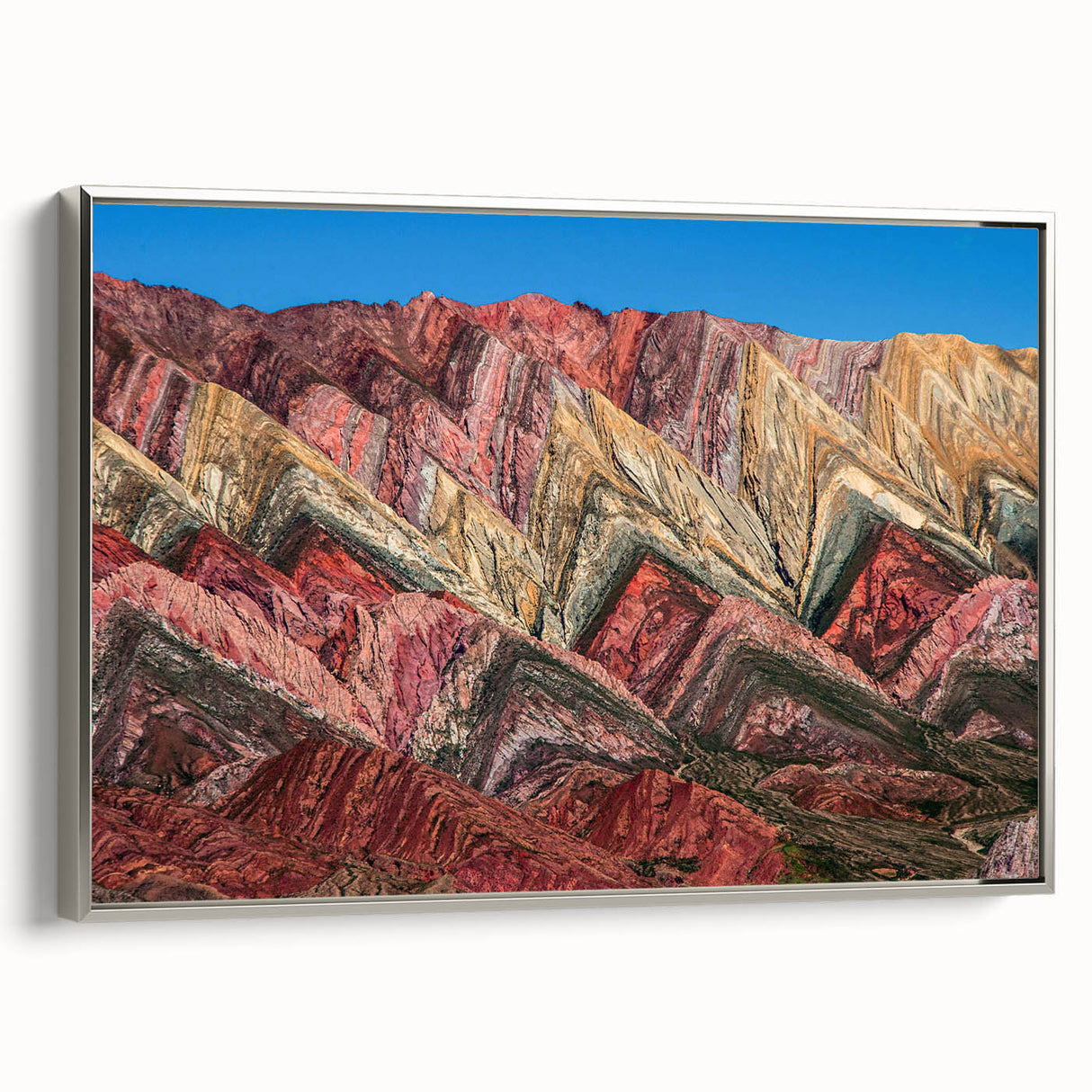 Landscape art painting of a scenic Argentinian view in vibrant colors on a silver-framed canvas, ideal for living room decor.