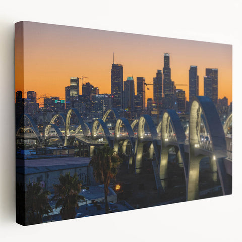 Los Angeles skyline depicted in muted gray and blue tones on a large stretched canvas, ideal for kitchen wall art.