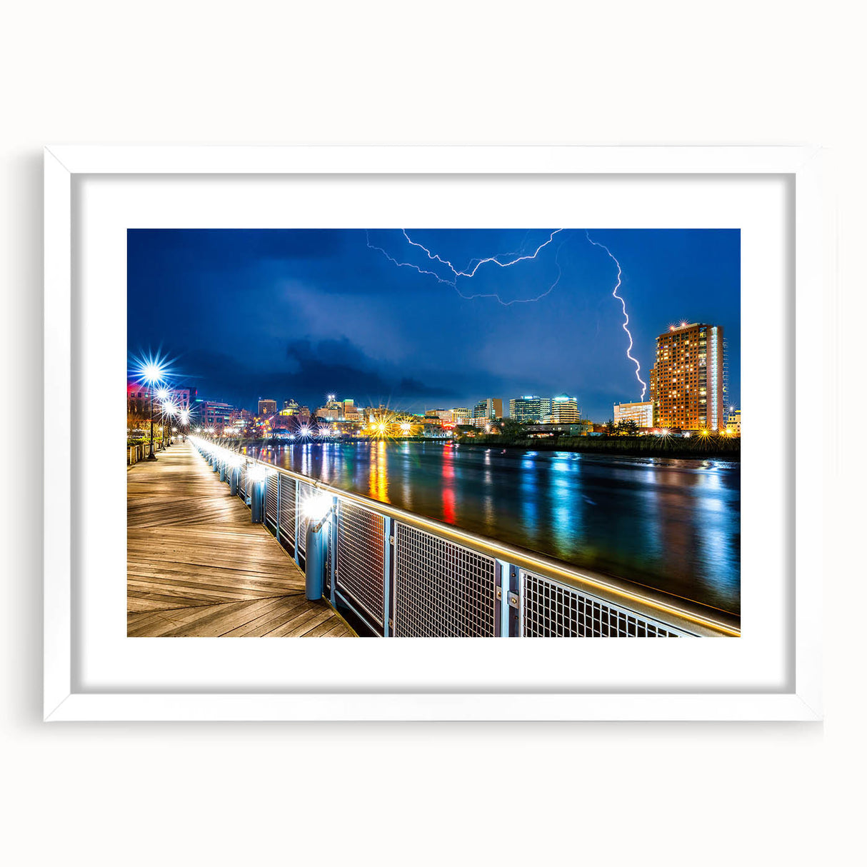 Abstract art print of Delaware scenery in muted blue and green tones on a white-framed canvas.