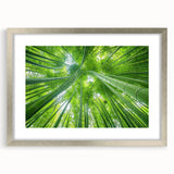 Textured abstract art print of a Hawaiian landscape in muted earth tones, framed in silver, ideal for bedroom decor.