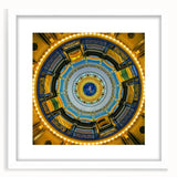 Abstract art print of Iowa scenery in muted greens and blues on a framed white mat, suitable for dining room decor.