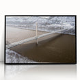 Large abstract wall art featuring a blend of blue and gray tones on a framed acrylic, ideal for modern living room decor.
