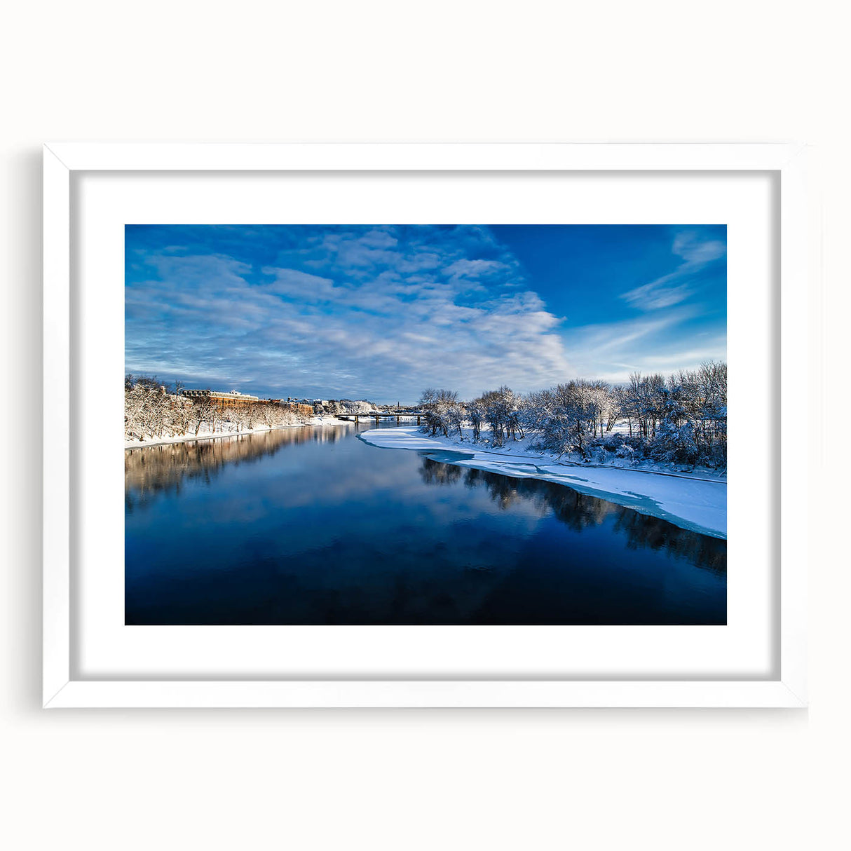Abstract art print of Maine scenery in muted blue and green hues, framed with a white mat.
