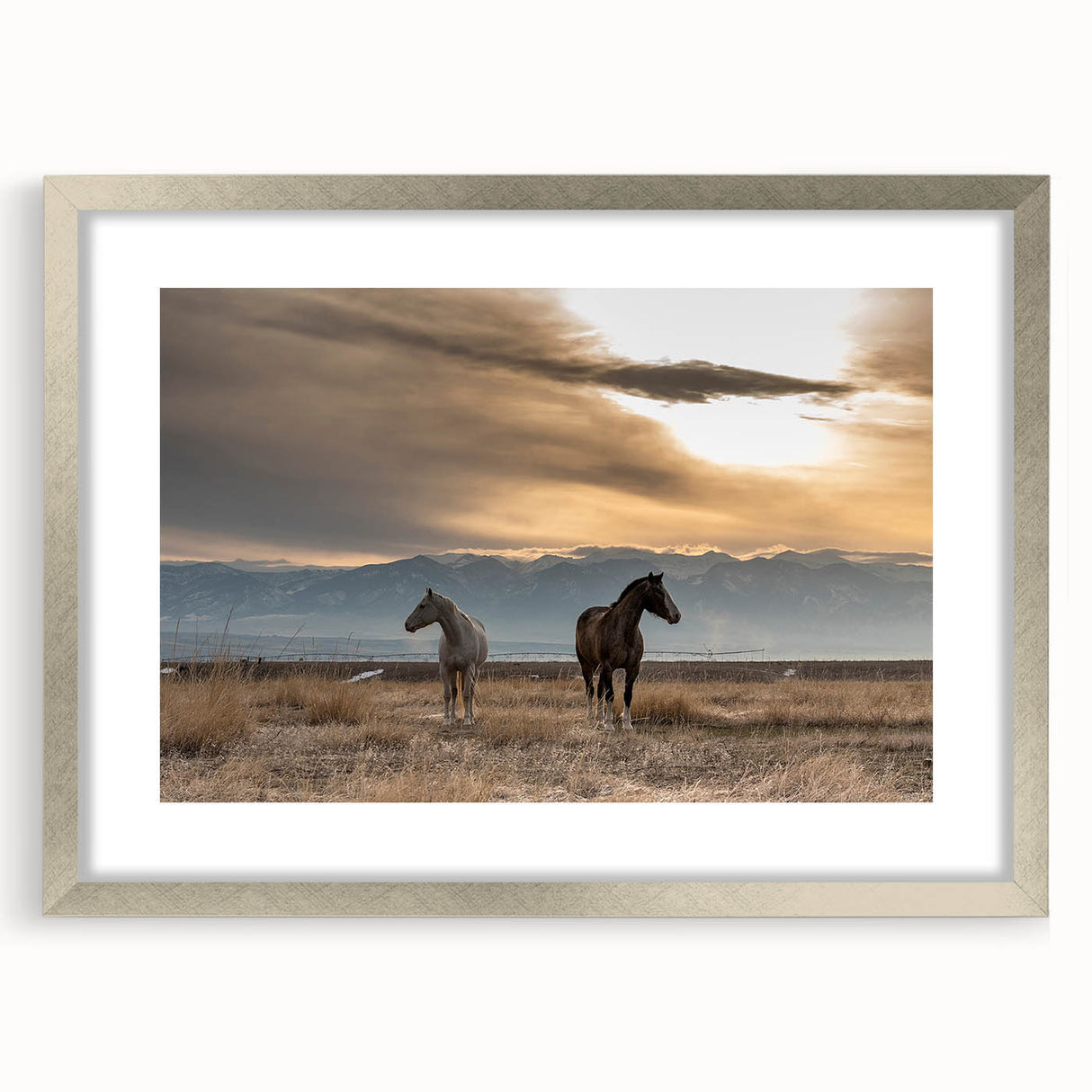 Textured abstract art print of Montana scenery in muted earth tones on a framed canvas, suitable for bedroom decor.