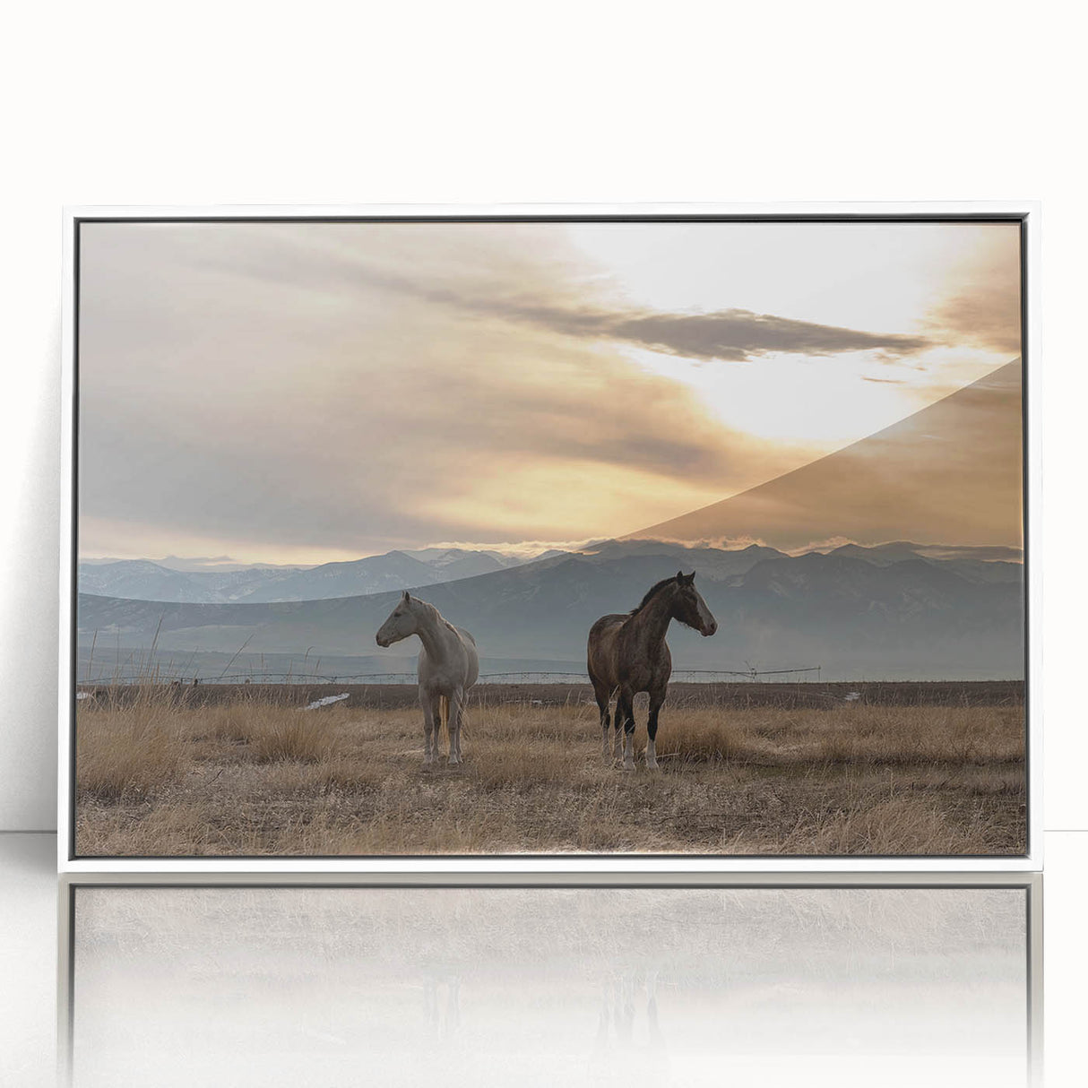 Acrylic print of a Montana landscape in soft pastel colors, framed in white, suitable for modern nursery decor.