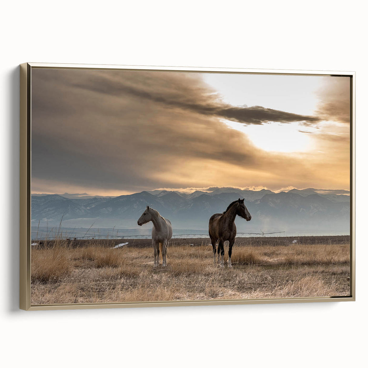 Framed canvas featuring a vintage-style landscape painting of Montana scenery, with muted earth tones.