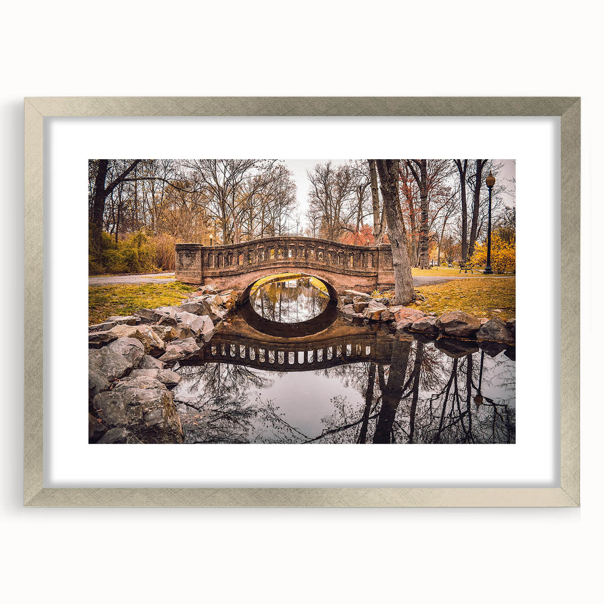 Textured abstract art print of a New Jersey scenery in muted earth tones on a framed silver mat, ideal for bedroom decor.