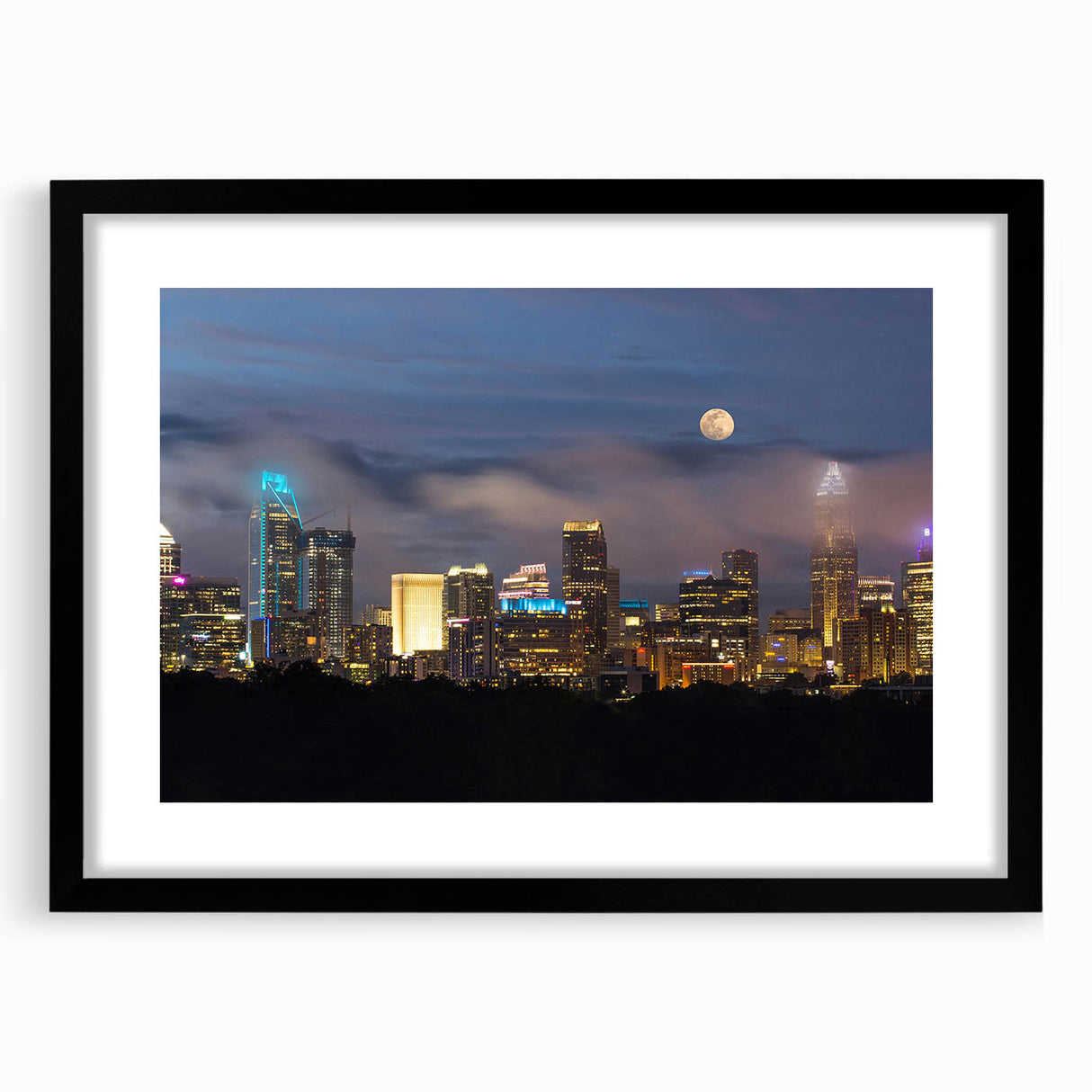 Extra large framed wall art of an abstract Charlotte skyline in colorful textured tones, ideal for living room decor.