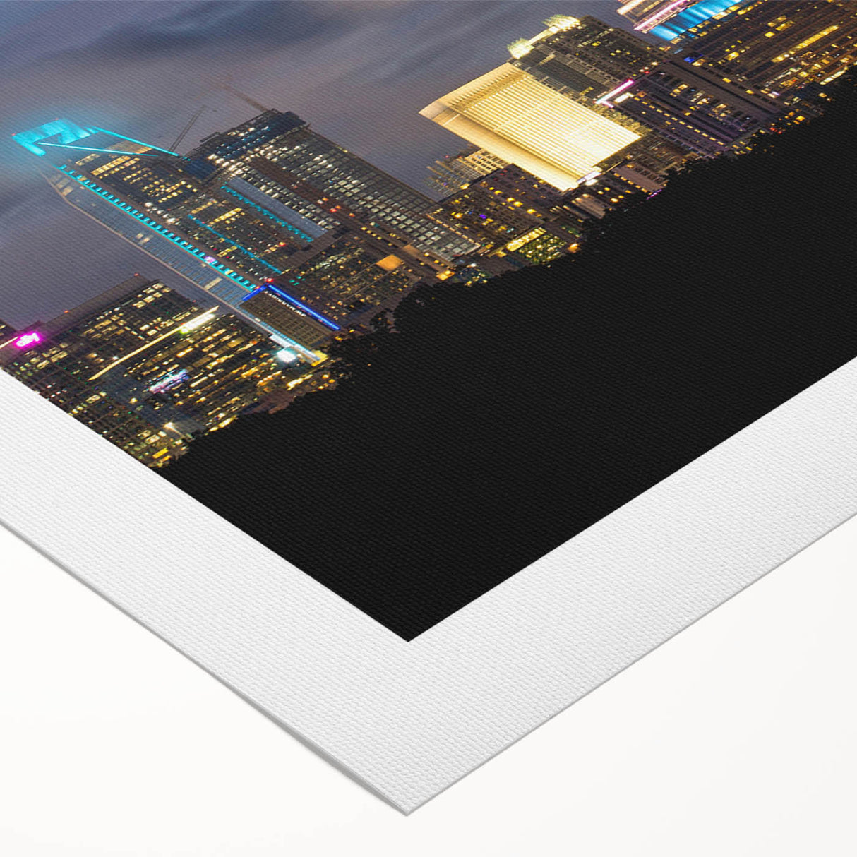 Art deco poster of Charlotte skyline in muted metallic tones on rolled canvas, suitable for dining room decor.